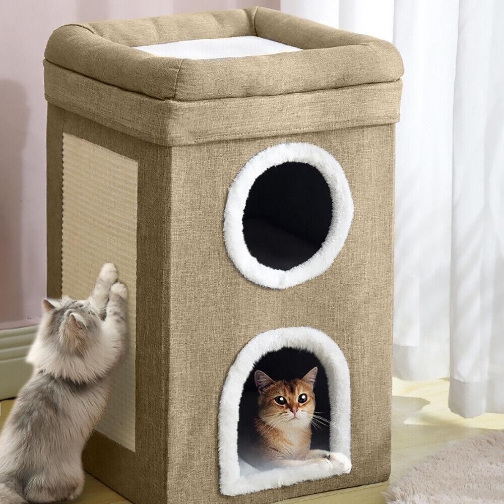 "Brown cat house with a window and plush toys inside." - UKBuyZone