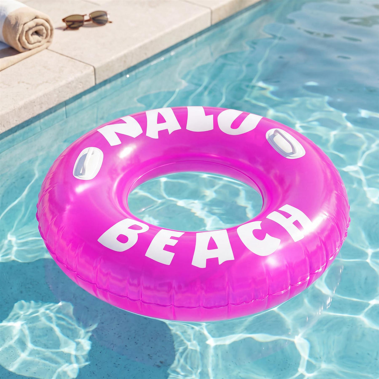 Bright pink inflatable pool float shaped like a ring, featuring white text that reads "NALO BEACH."