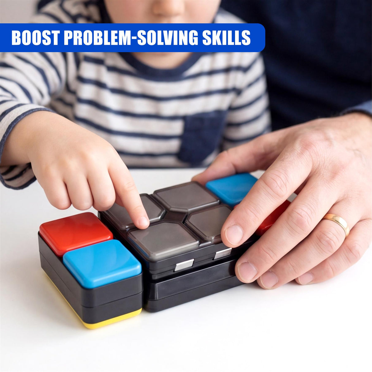 Two people work together manipulating a multi-colored, segmented puzzle cube game on a surface.