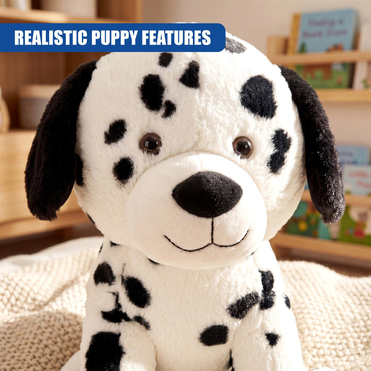 Realistic Dalmatian soft toy puppy with black spots and floppy ears.