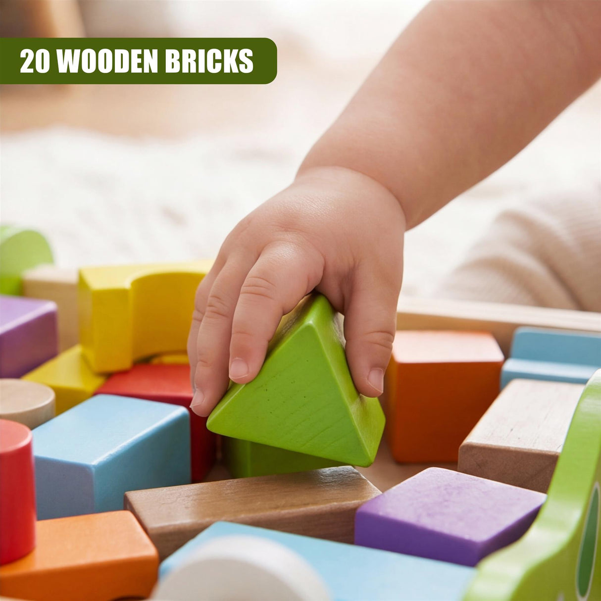 A hand selects a bright green wooden triangular block near other colorful wooden blocks.