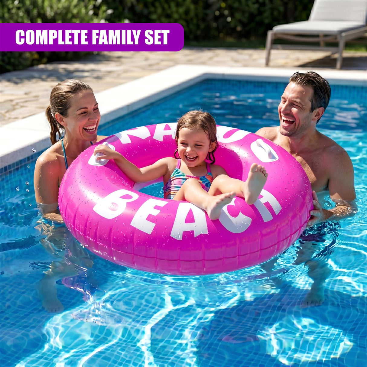 A family enjoys floating in a pool using a large, pink inflatable ring marked with the word "BEACH."