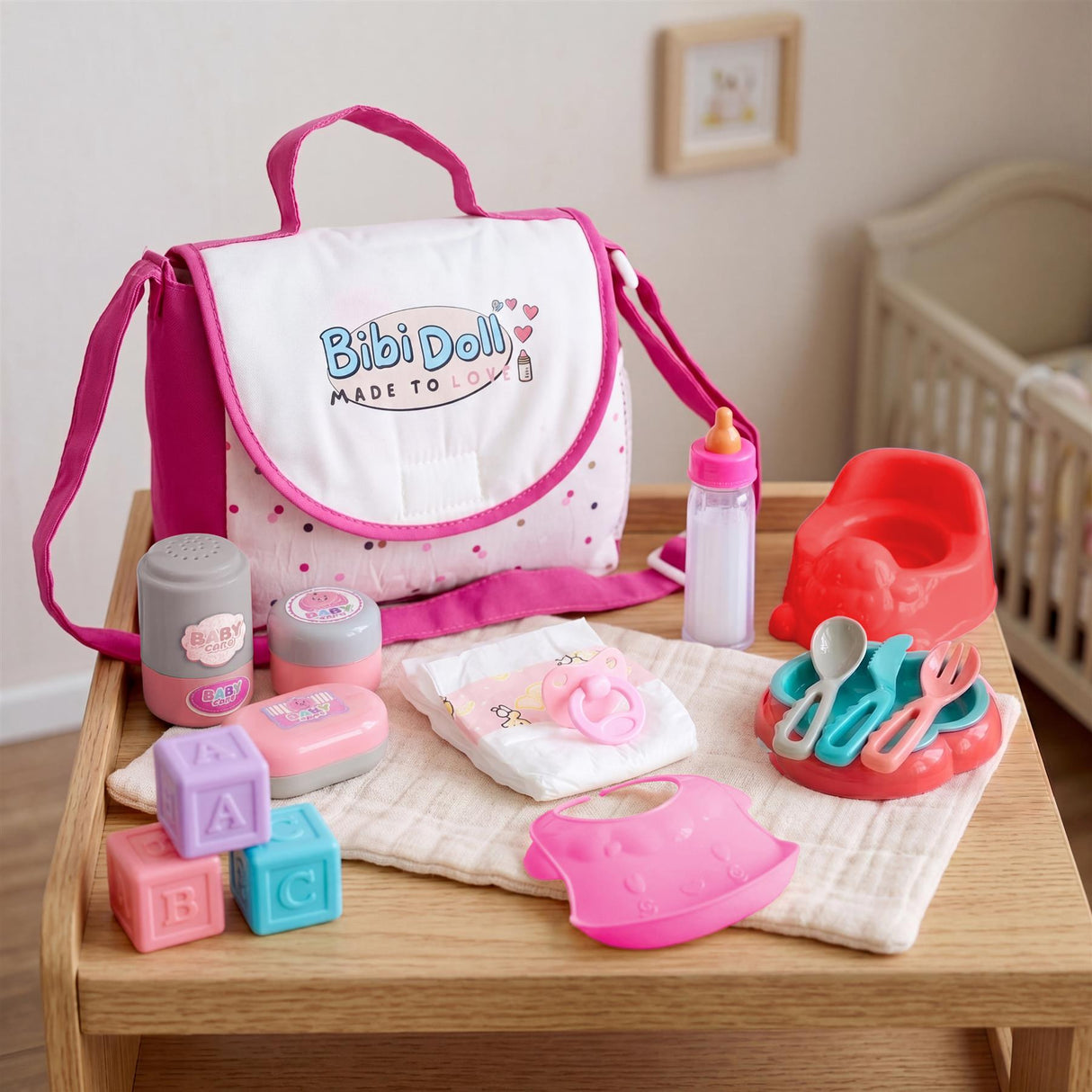 Set of baby toys, including a changing bag, bath accessories, and colorful storage blocks.