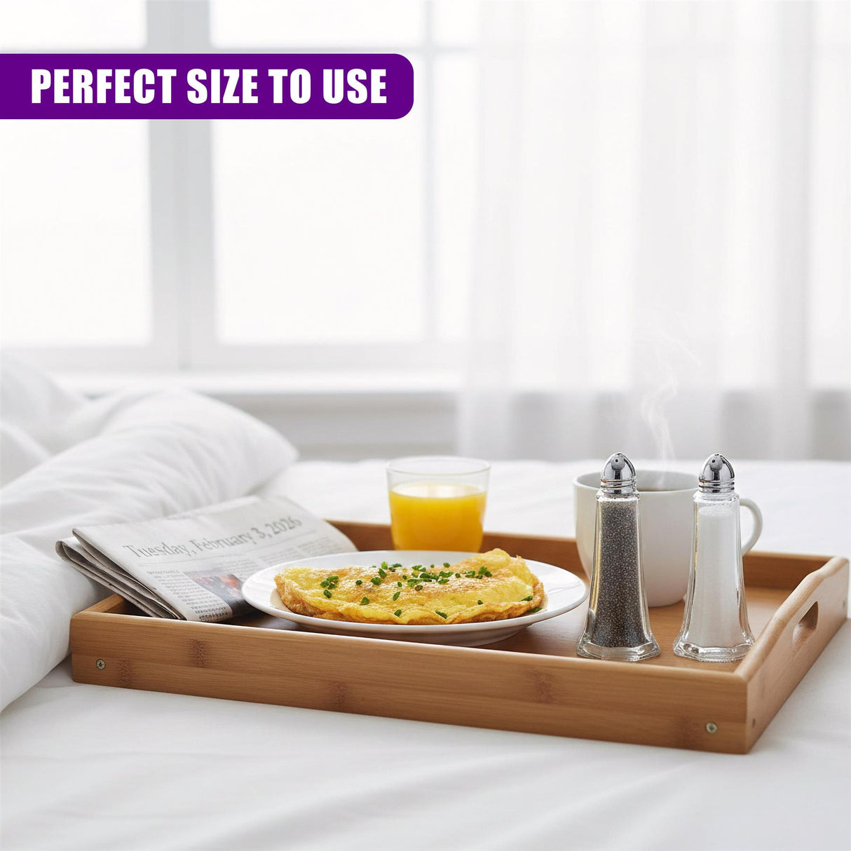 Two clear salt and pepper shakers sit on a wooden tray alongside a cup of coffee.