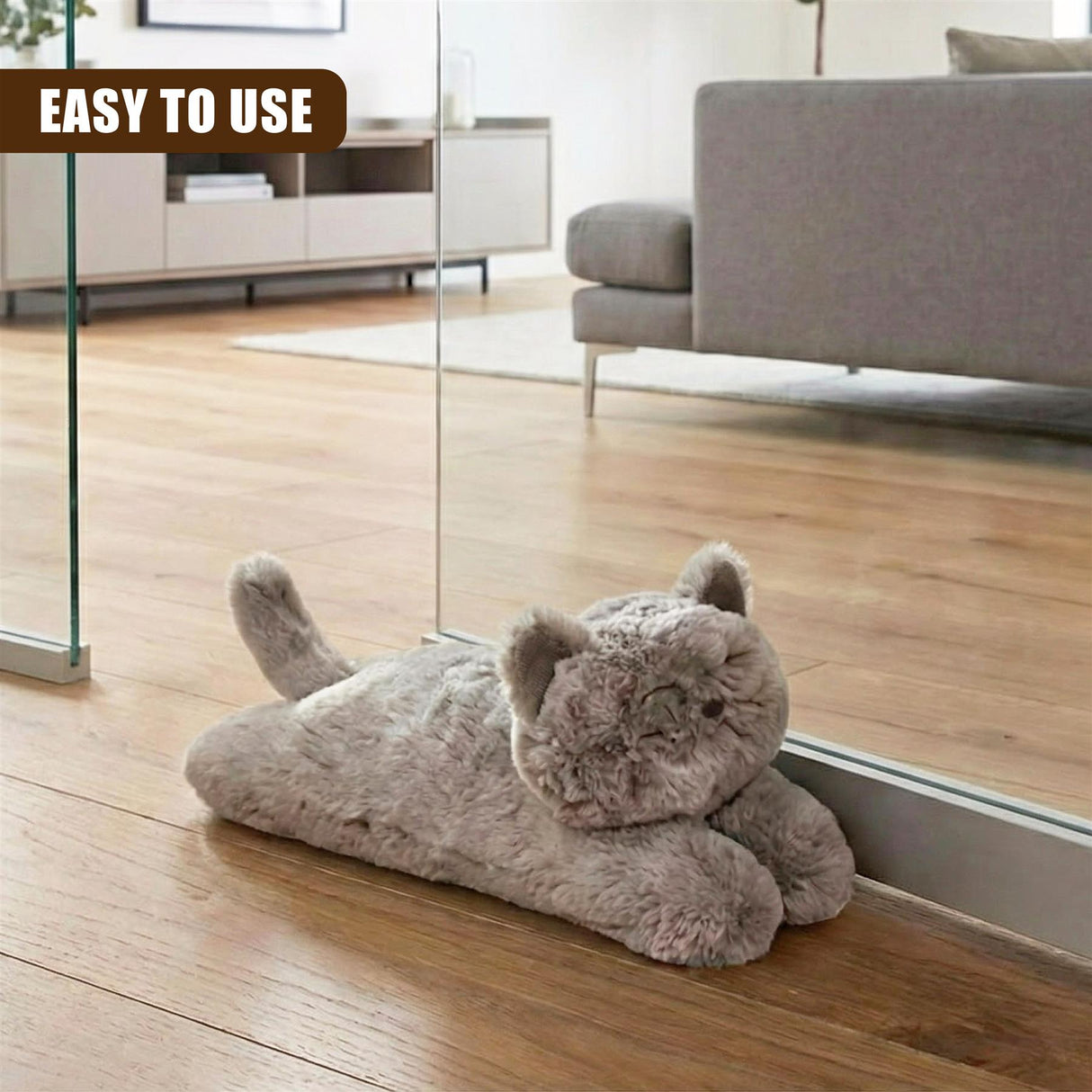 Fluffy cat door stopper on floor, standing in front of mirror and wall. Gray carpet under fluffy cat. - UKBuyZone