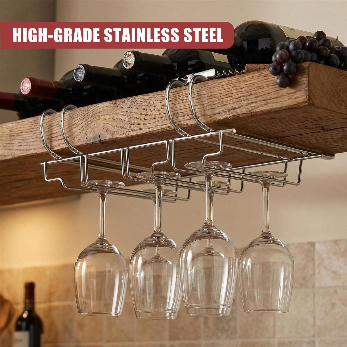 Under Shelf Wine Glass Rack by GEEZY holding four wine glasses under a wooden shelf with bottles and grapes above