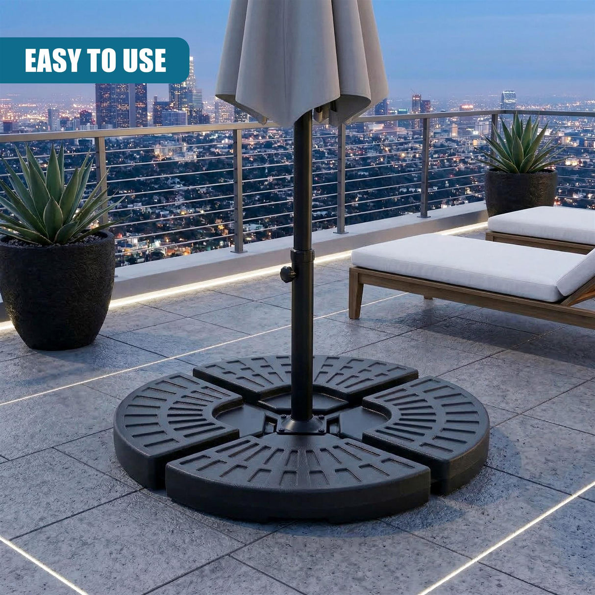 Round, heavy black base for a patio parasol stand featuring radial structural support design.