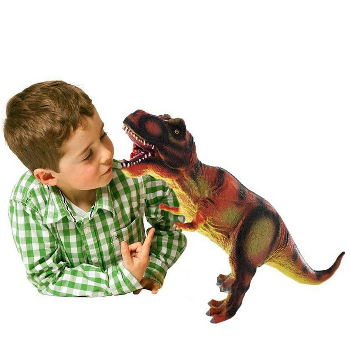 A young boy in a green plaid shirt plays with a soft, brown T-Rex dinosaur toy.