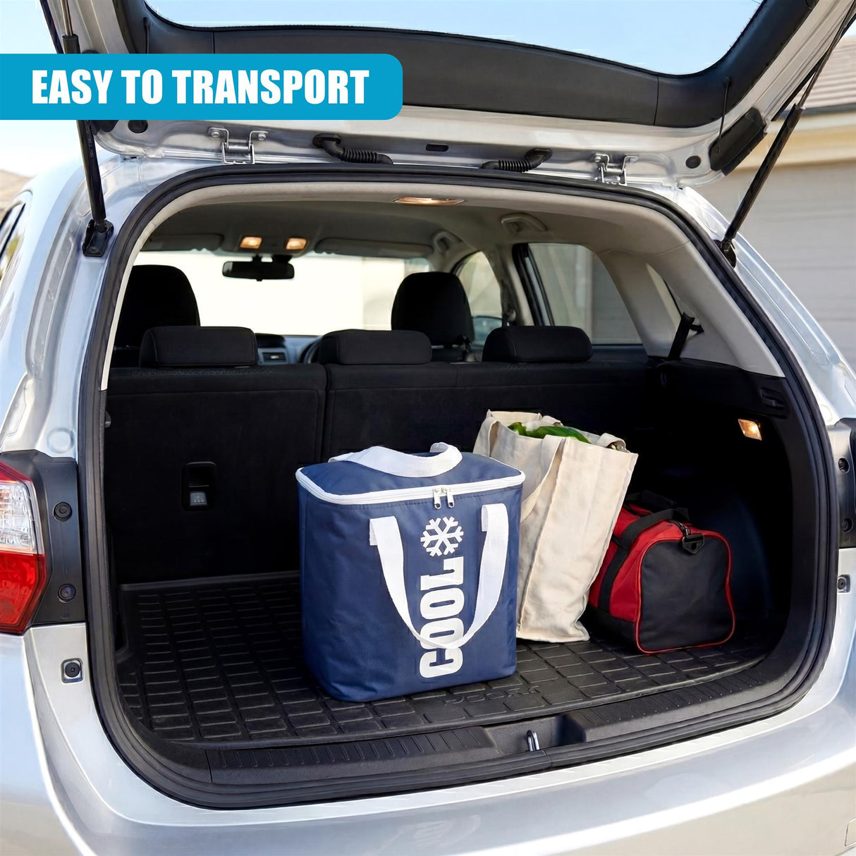 Vehicle trunk shows a blue cooler bag, a large bag, and a smaller accessory bag inside.