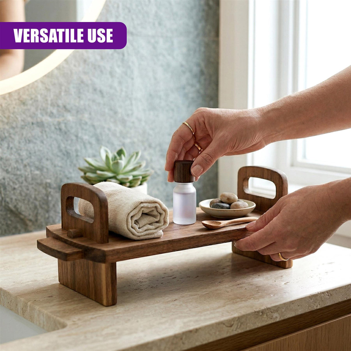 Acacia wood platter arranged with soap, rolled towel, decorative stones, and small wooden utensils.