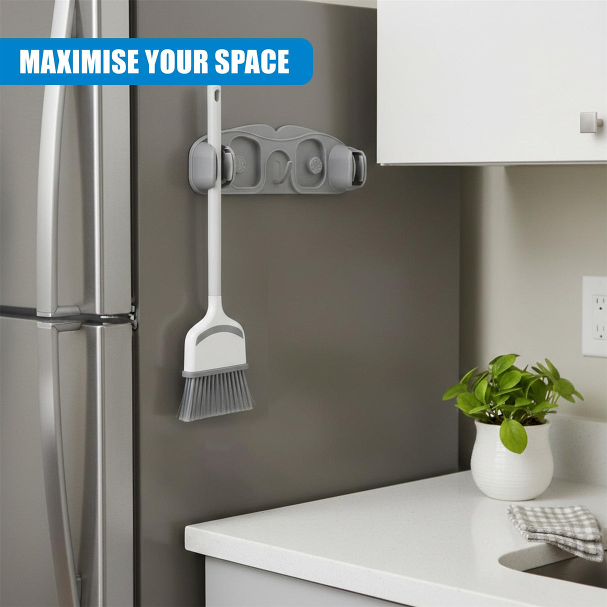 Gray wall mount holder with slots displays a standing mop and cleaning brush.