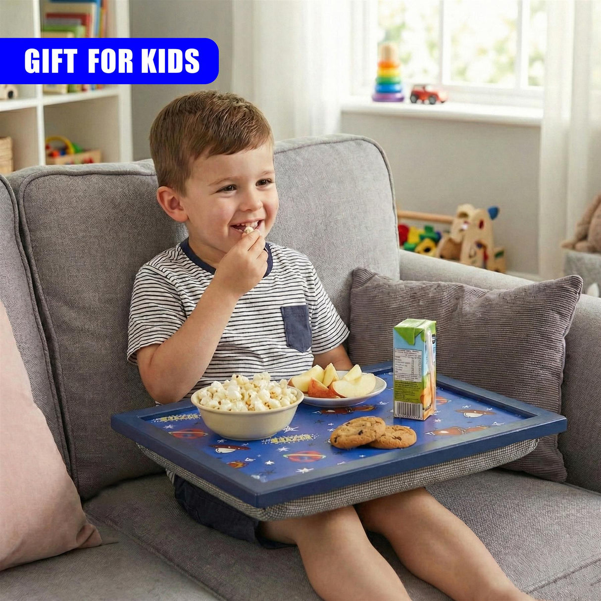 Lap tray displayed on a couch, holding various snacks, crackers, and a drink.
