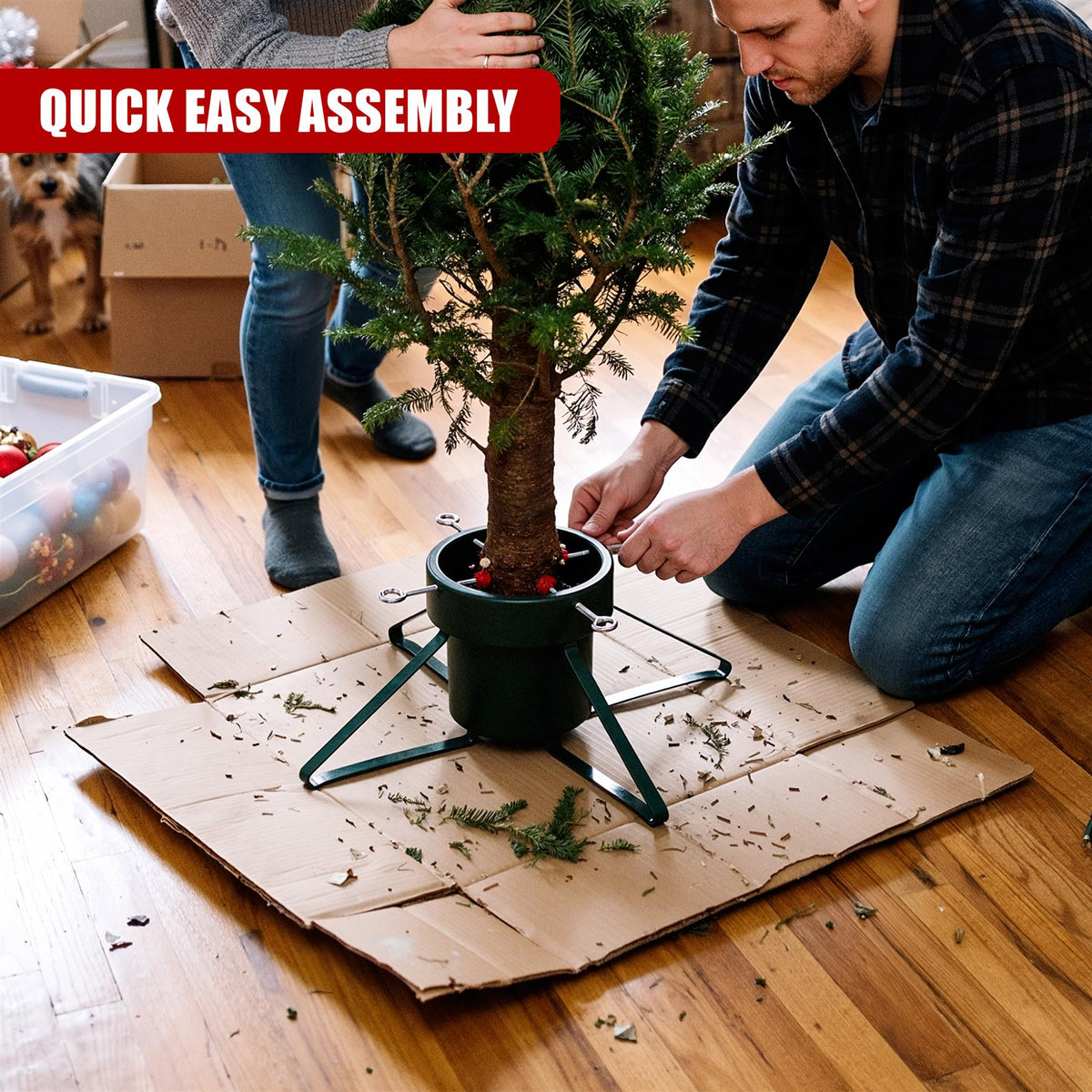 A man and woman assemble a green metal Christmas tree stand on a wooden floor