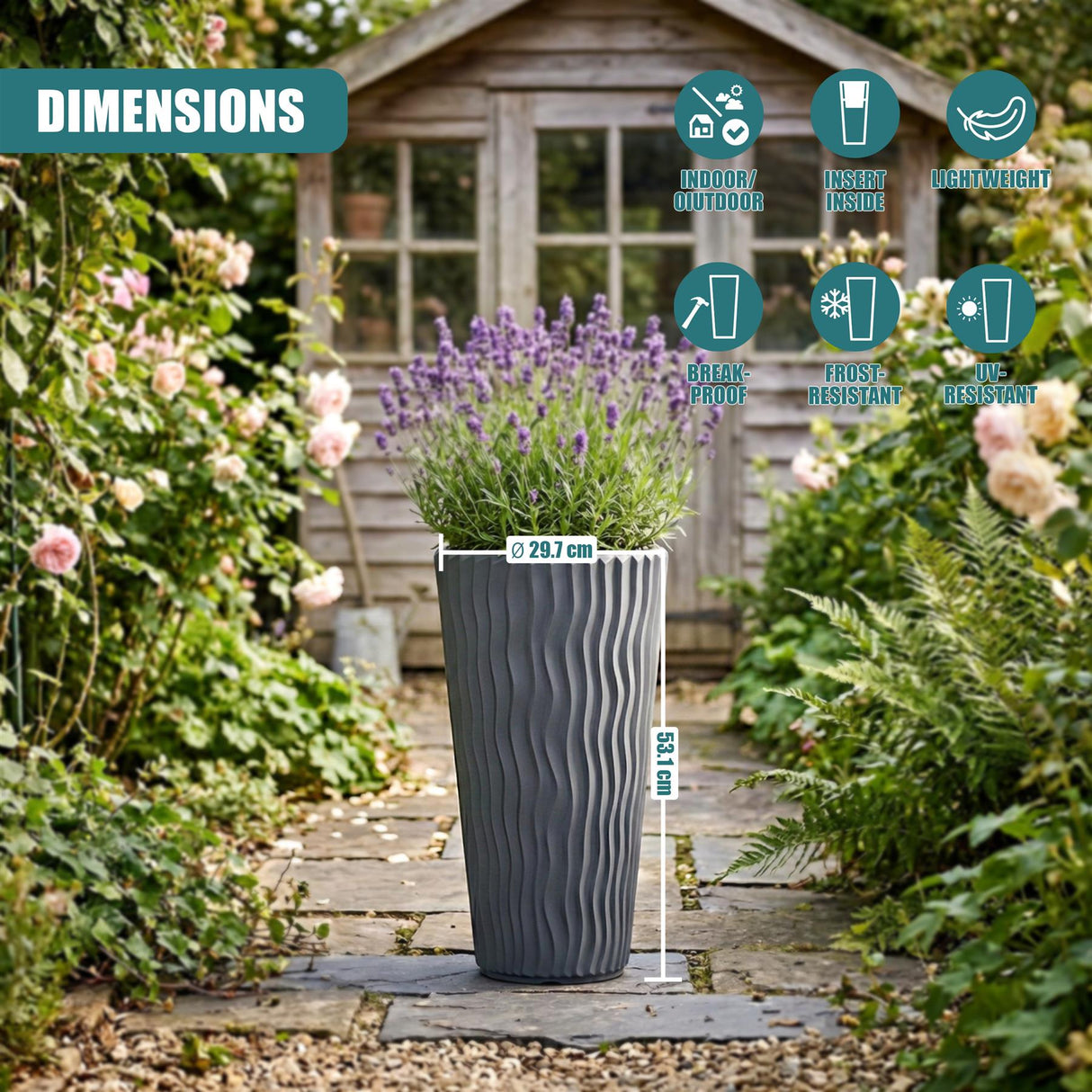 Anthracite striped flower pot shown outdoors among flowering garden plants and wood background.