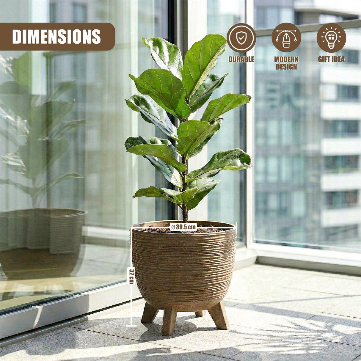 A leafy green plant is housed in a textured, woven brown pot that rests on four small wooden legs.