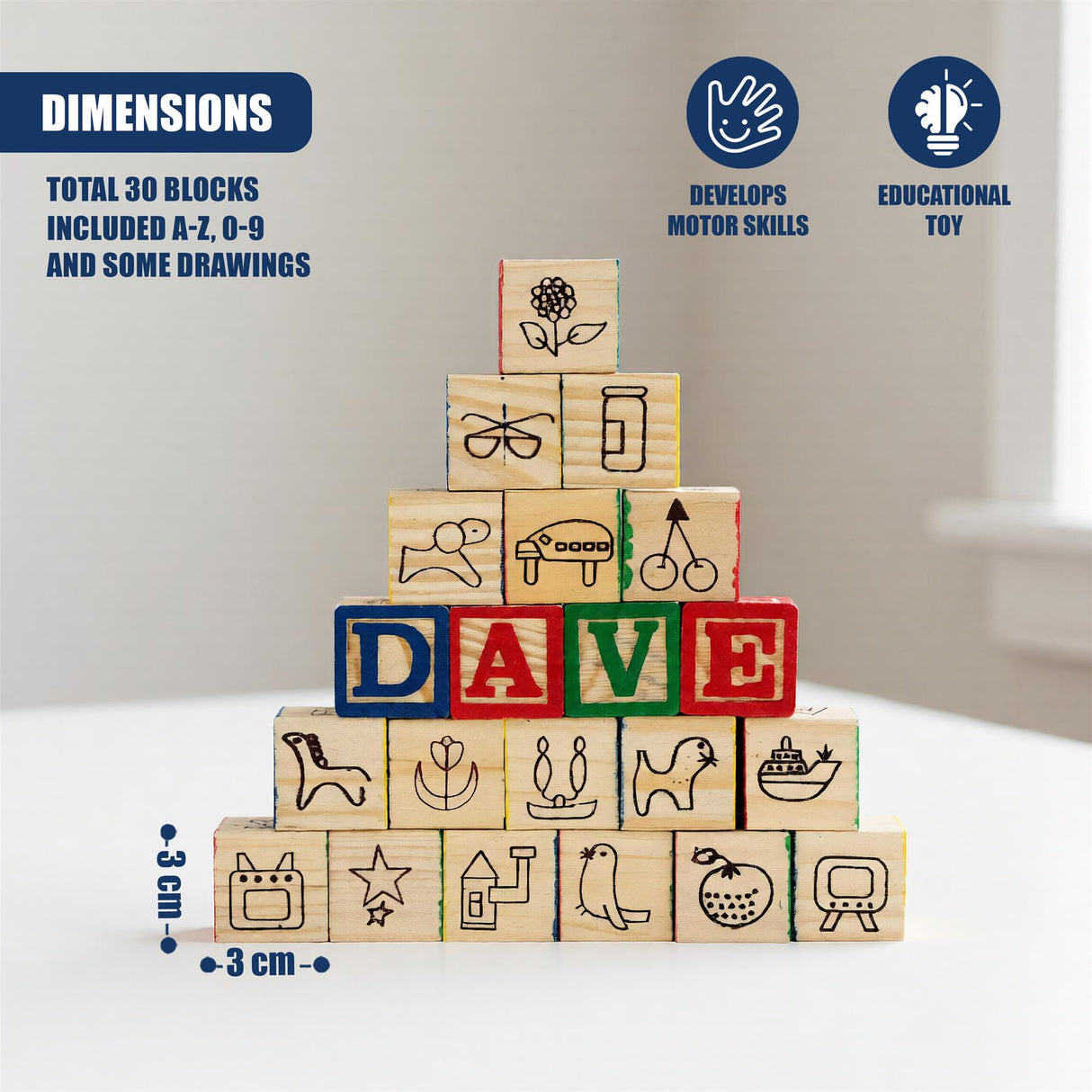 Stacked wooden blocks display letters, numbers, and engraved drawings of objects and animals.