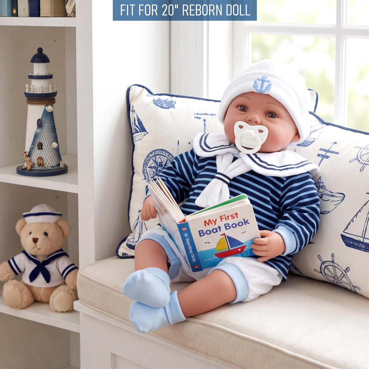 Doll modeling a blue and white striped sailor outfit, hat, and bloomer set, holding a boat book.