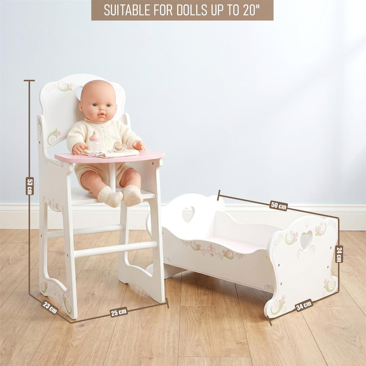 White wooden set featuring a high chair with tray and a matching heart-decorated doll cradle.