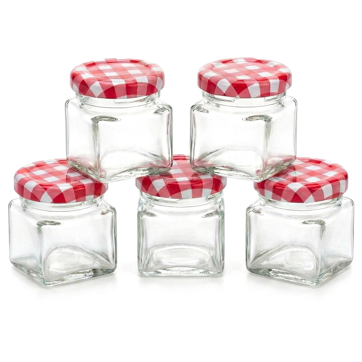 Five small, cubic glass jars are displayed with coordinating red and white checkered lids.