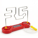 A red game base with an attached metal wire circuit and yellow plastic handling piece.