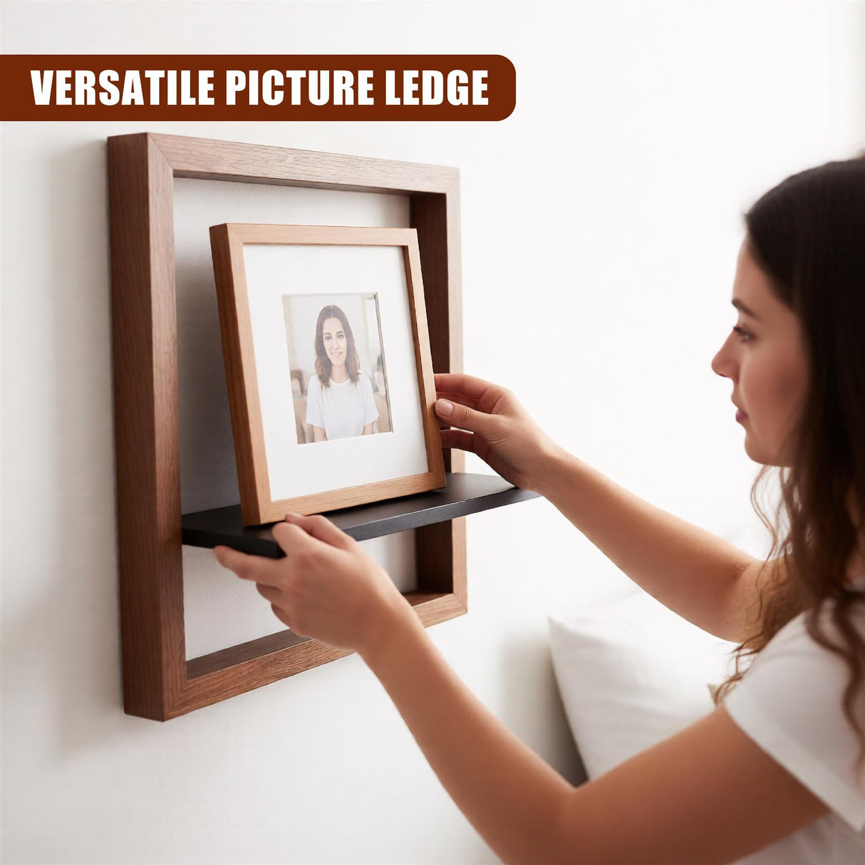 "A woman placing a photo frame on a wall-mounted shelf, showcasing its use as a versatile picture ledge." - UKBuyZone