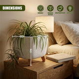 Modern gray planter pot with three wooden legs, holding green foliage, displayed with dimensions.