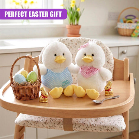 Two plush chicks sit on a wooden chair with egg baskets, small yellow eggs, and miniature figurines.