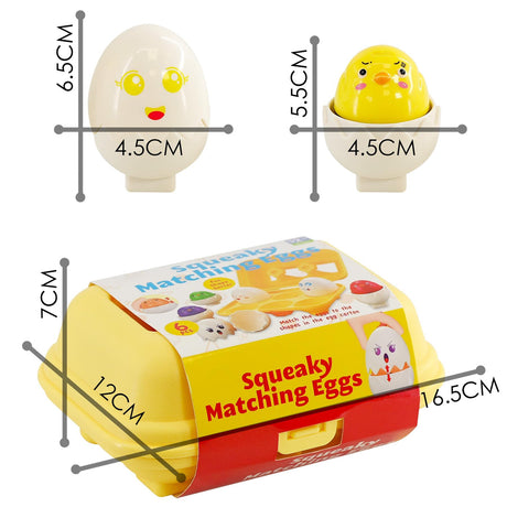 Toy set featuring two matching plastic eggs, one white and one yellow, and a cardboard storage box.