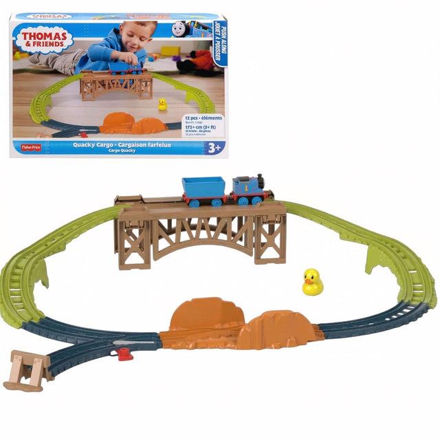 Toy train set featuring curved track, a central loading bridge, engine, and yellow accessory piece.