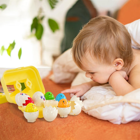 Set of brightly colored plastic eggs and yellow matching game pieces are laid out on the table.