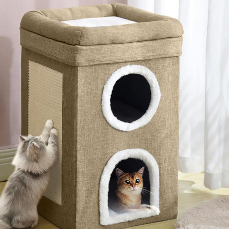 "Brown cat house with a window and plush toys inside." - UKBuyZone