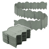Stacked and laid out green plastic sections forming curved garden edging panels.