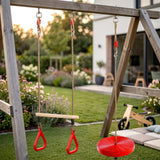 Wooden swing set features two hanging swings and a red circular swing seat in a garden.