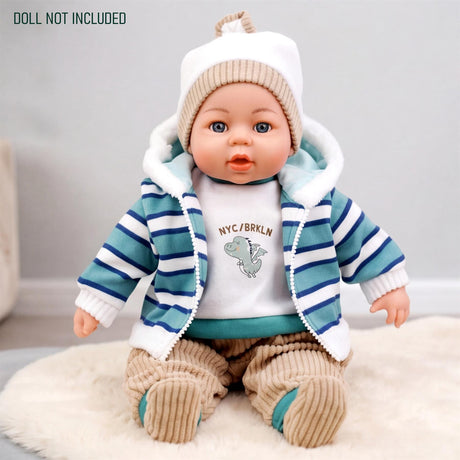 Doll dressed in a blue and white striped jacket, white knit hat, and tan knit pants.
