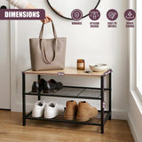 Two-tiered black metal shoe rack holding several pairs of footwear and accessories.