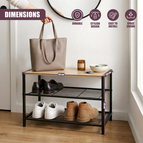 Two-tiered black metal shoe rack holding several pairs of footwear and accessories.