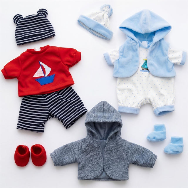 Flat lay of baby clothing set: red shirt, striped pants, blue romper, grey hooded cardigan, and booties.