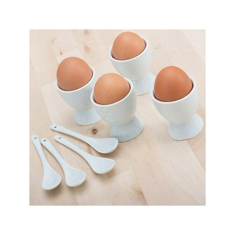 A set of eight porcelain egg cups and spoons displayed on a white surface.