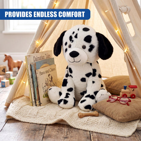Fluffy Dalmatian plush toy sits in a tent with a stack of books, glasses, and wooden toys.