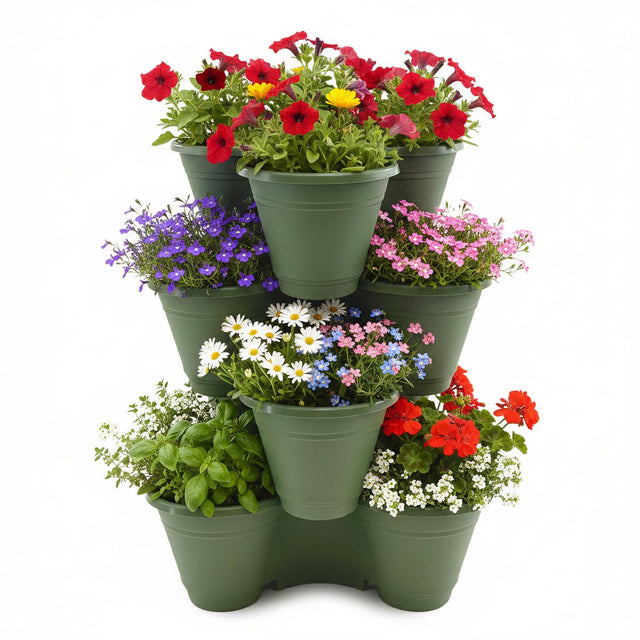 A stack of dark green planters filled with mixed colorful flowers and vibrant greenery.