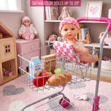 Metal shopping trolley holding a doll and assorted toy groceries like apples and bread.