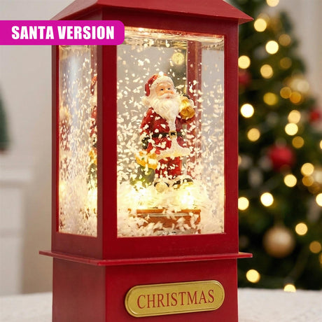Red lantern display holds a Santa Claus figure illuminated by artificial snow and glowing lights.