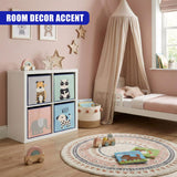 "Brightly colored, playful bedroom featuring wooden flooring and white walls. Pink bed with canopy, adorned with child's toys and books. A crib with animal designs next to a pink carpet and a cozy corner with toys. A room filled with joy and creativity for a young child." - UKBuyZone