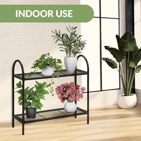 "Metal two-tier plant stand, Geezy brand, sturdy and stylish, ideal for indoor or outdoor use, perfect for displaying potted plants or decorative items, ukbuyzone."