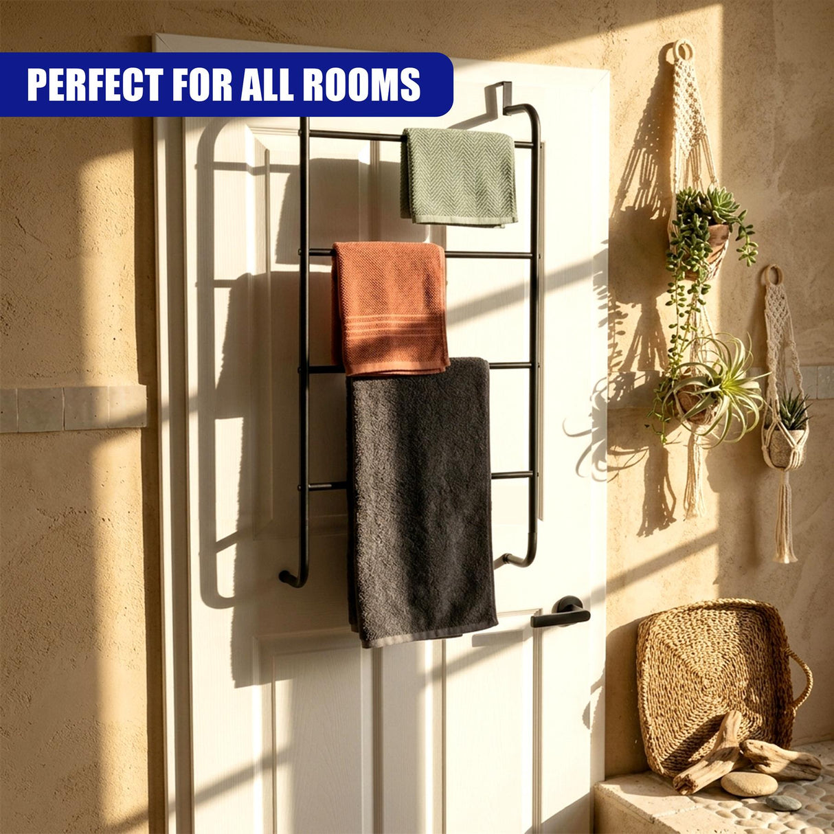 Black metal towel rack on a white door holds multiple towels in various colors.