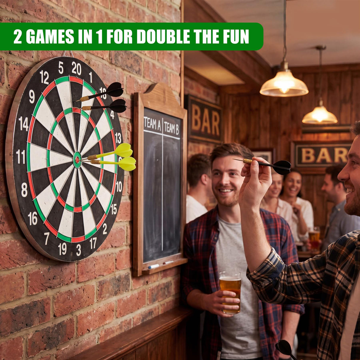 A man holds darts in front of a large, multi-section dartboard mounted on a brick wall.