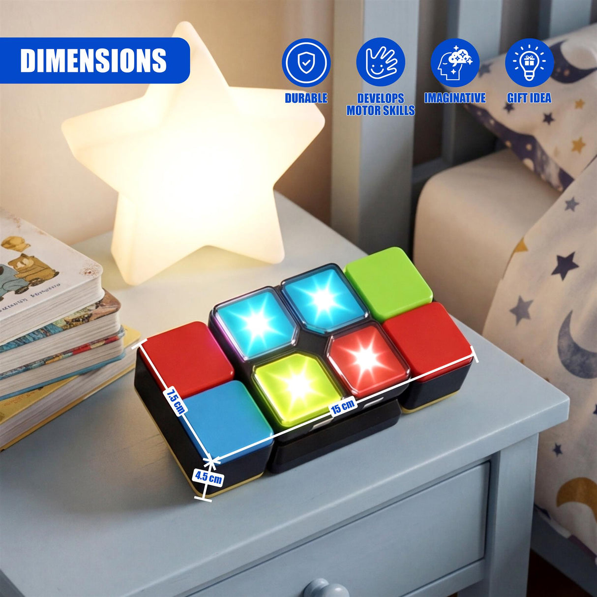 A colorful, modular cube toy rests on a gray dresser surface next to a star lamp.