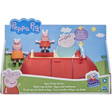 A red toy car set with cutout figures of Daddy Pig, Mommy Pig, and Peppa Pig.