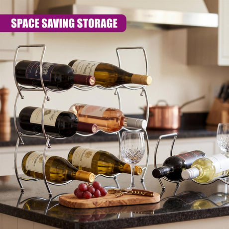 Three-tiered metal wire rack holding wine bottles on a dark countertop.