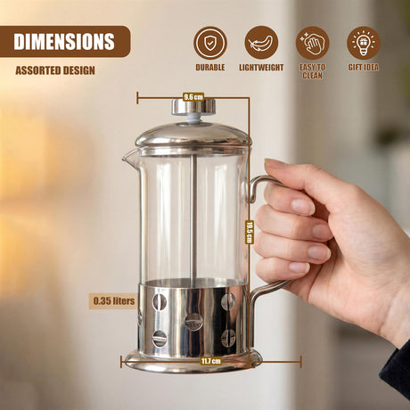 Stainless steel cafetiere with glass carafe section, measured and held by a hand.